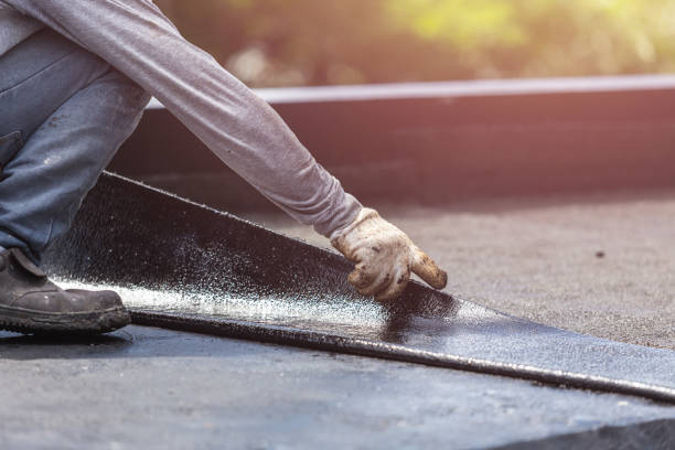 Professional Basement Waterproofing technician working in Alma, MI